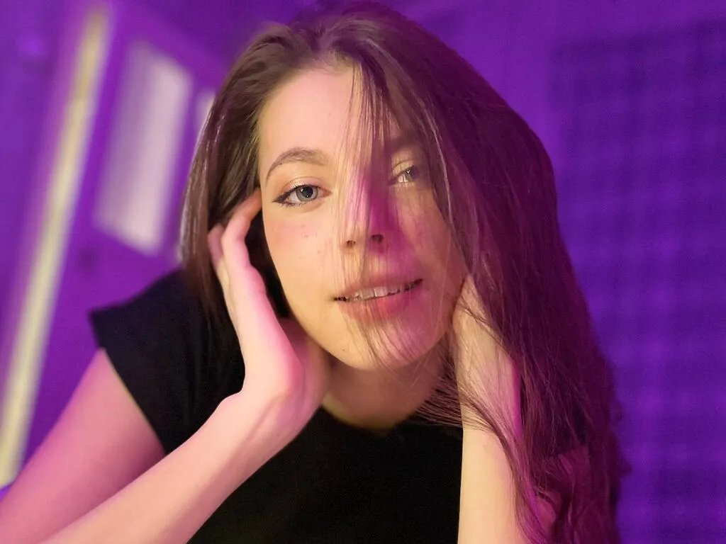 SharellLasiter — Morning light on bare skin, bold red lips, and secrets shared in whispers