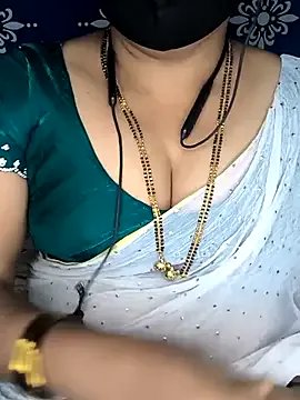 Anusha-09 — Oil on boobs and navel